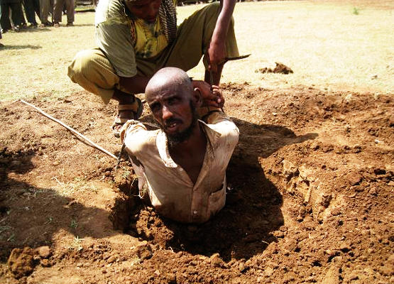 A Somali man ready to be stoned to death by Al-Shabab