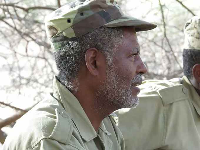 Is Andargachew Tsige a peaceful campaigner or an armed fighter?