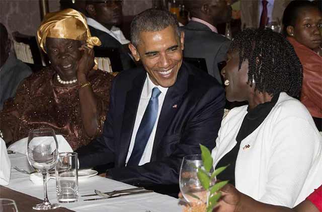 President Barak Obama shares a lough with his sister and step grandmother after he arrived in Nairobi, Kenya.