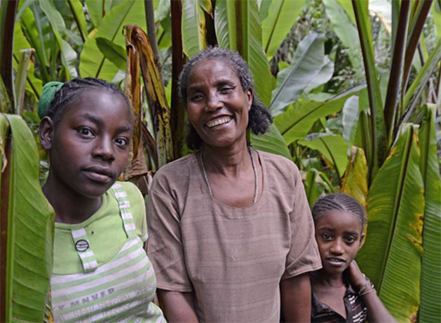 Ethiopian mother in southern Ethiopia at her inset farm