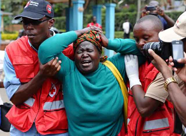 Kenyan woman mourns after the gunmen attacked Garissa University College