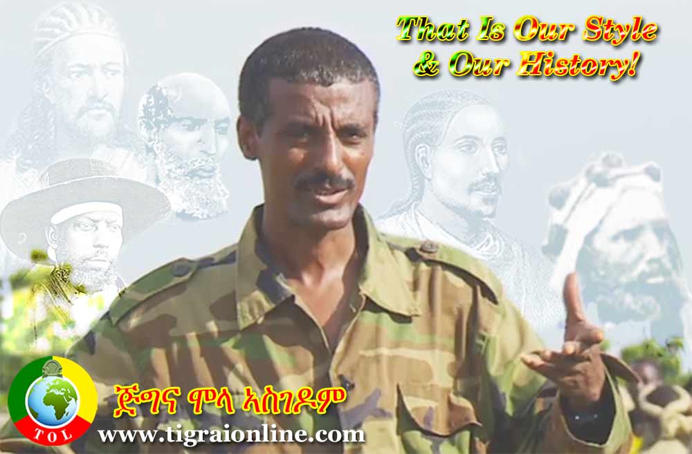 Mola Asgedom chairman of TPDM talks to his soldiers after crossing to Ethiopia