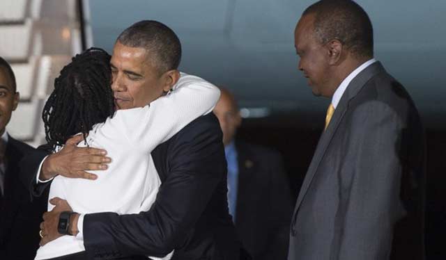 President Barak Obama hugs his sister Auma Obama moments after he arrived in Nairobi, Kenya.