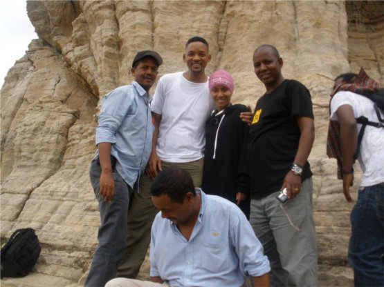 Holly wood Star Will Smith and some local people